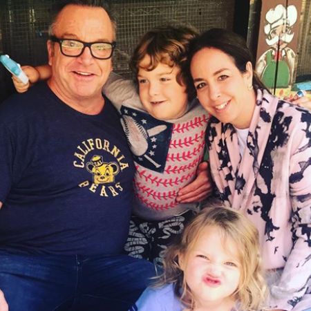Tom Arnold with his ex-wife, Ashley, and family